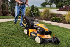 Walk-behind lawn mower being prepared for spring service at Legacy Small Engines in Stittsville Ottawa